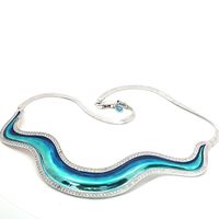 WAVE CRYSTAL STONES METALLIC BLUE GLAZED NECKLACE
