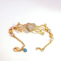 DALì GOLD CRYSTAL STONES BRACELET