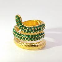 SNAKE GOLD GREEN STONES RING